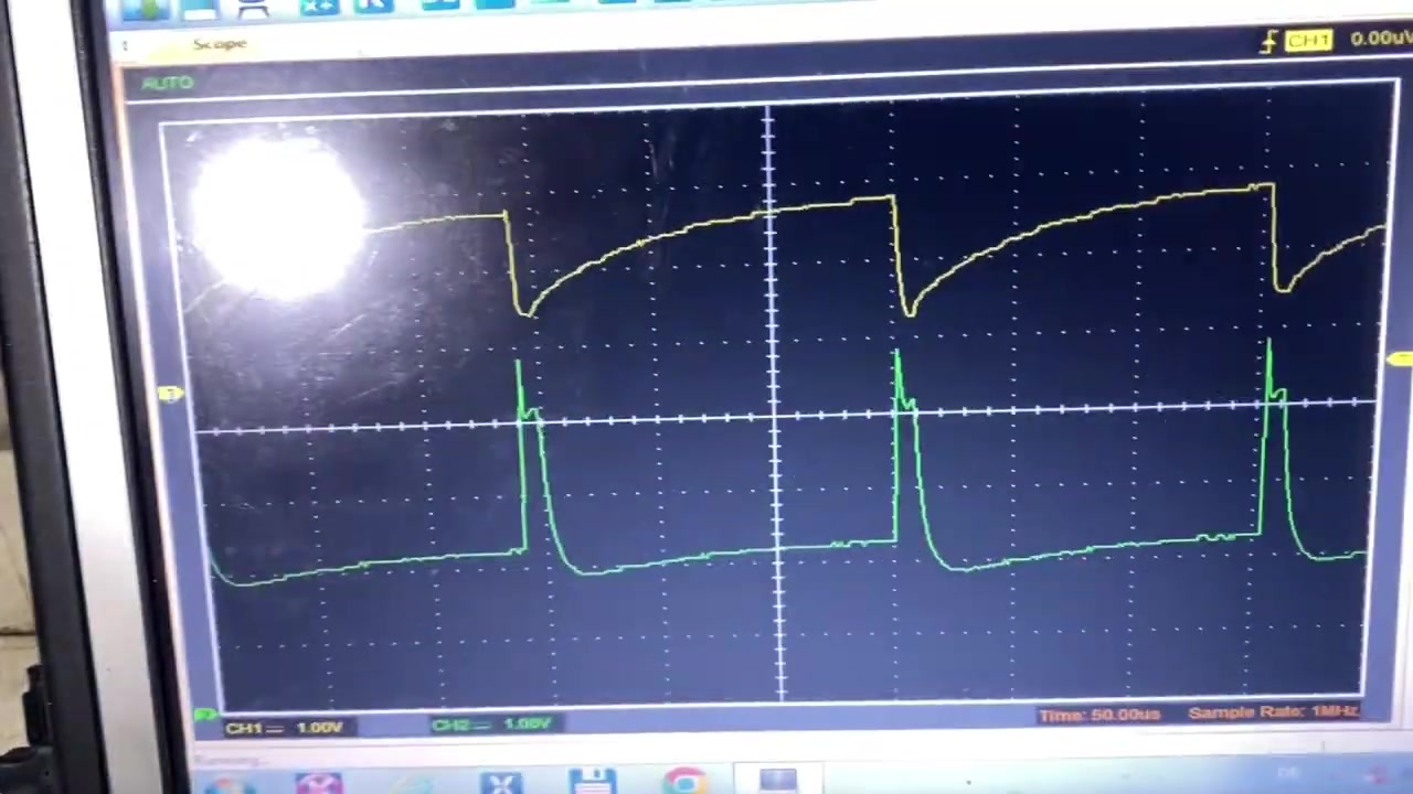 Oscilloscope showing a distorted CAN bus signal, not a clean square wave.